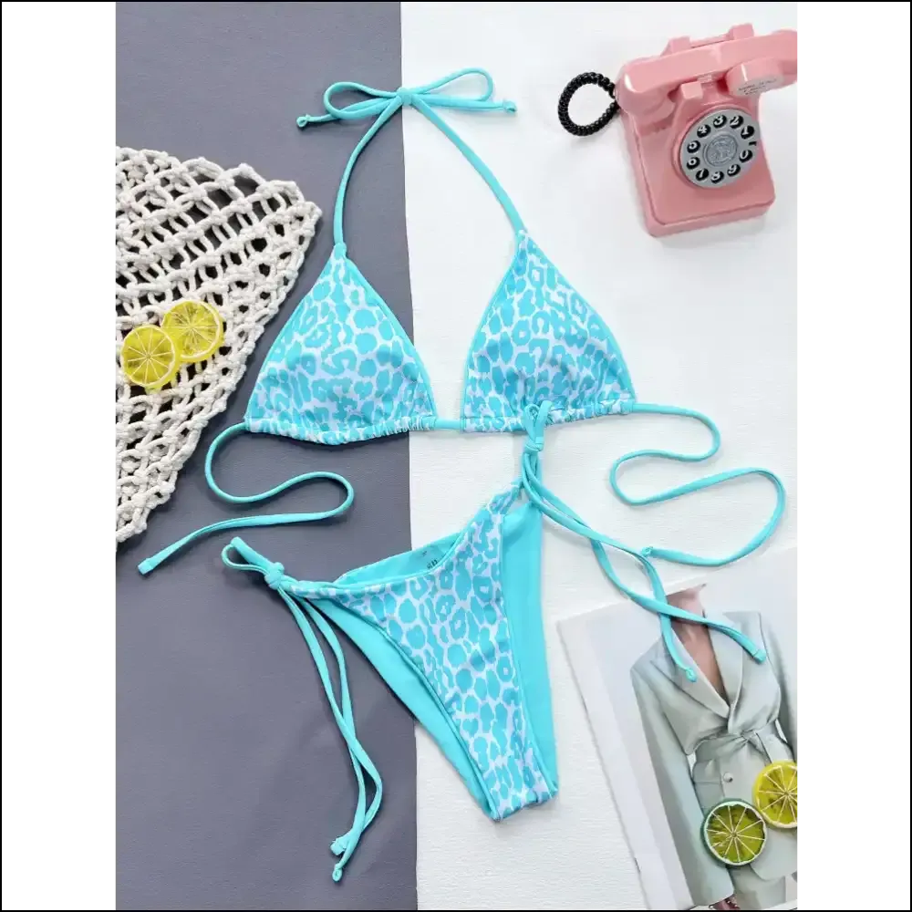 Get Wild in Style with Needful Things Leopard Print Halter Bikini! 🐆✨