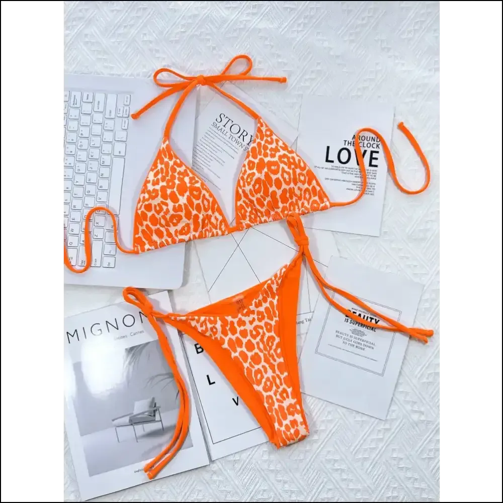 Get Wild in Style with Needful Things Leopard Print Halter Bikini! 🐆✨