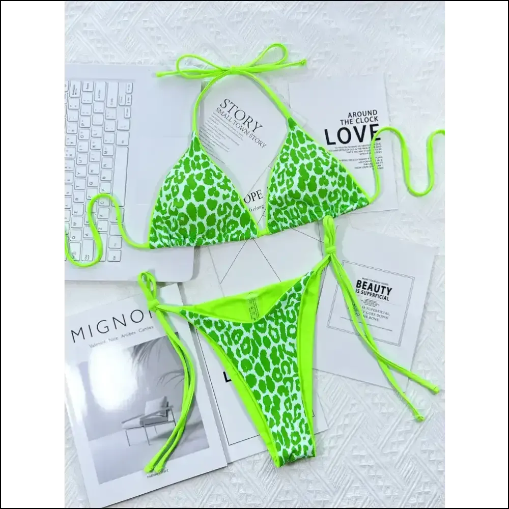 Get Wild in Style with Needful Things Leopard Print Halter Bikini! 🐆✨
